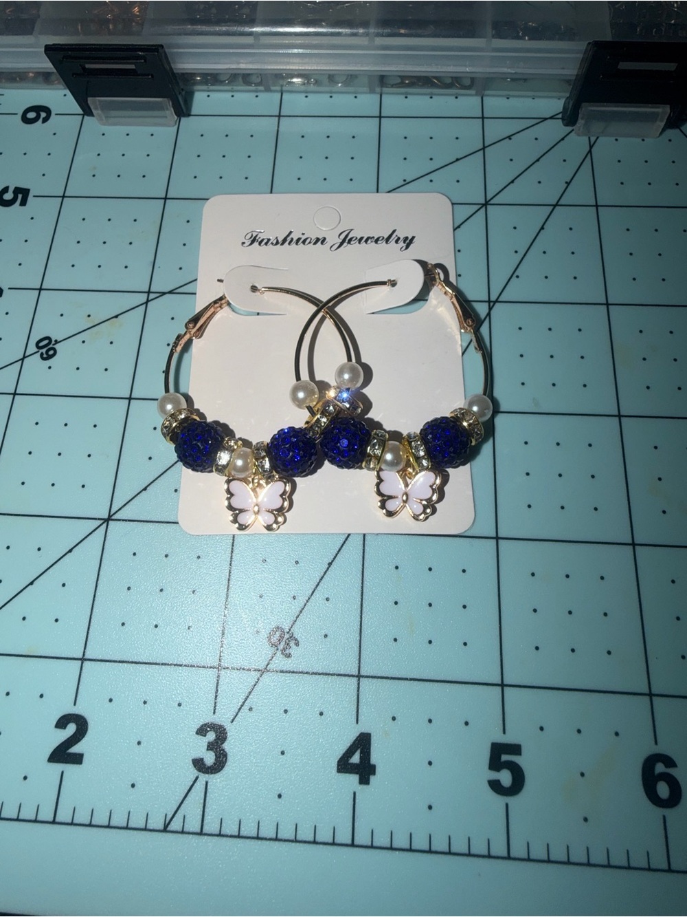 Fashion Jewelry Gold Hoop Earrings with Blue Beads and White Butterfly Charms